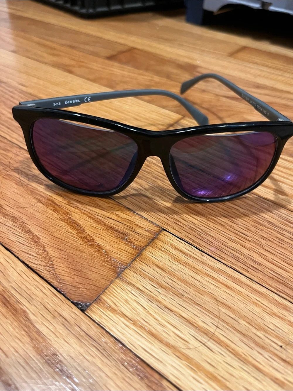 Diesel Men’s Black Frame Sunglasses with Blue-Green Mirrored Lenses